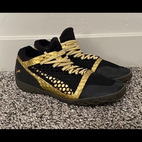 black and gold gym shoes